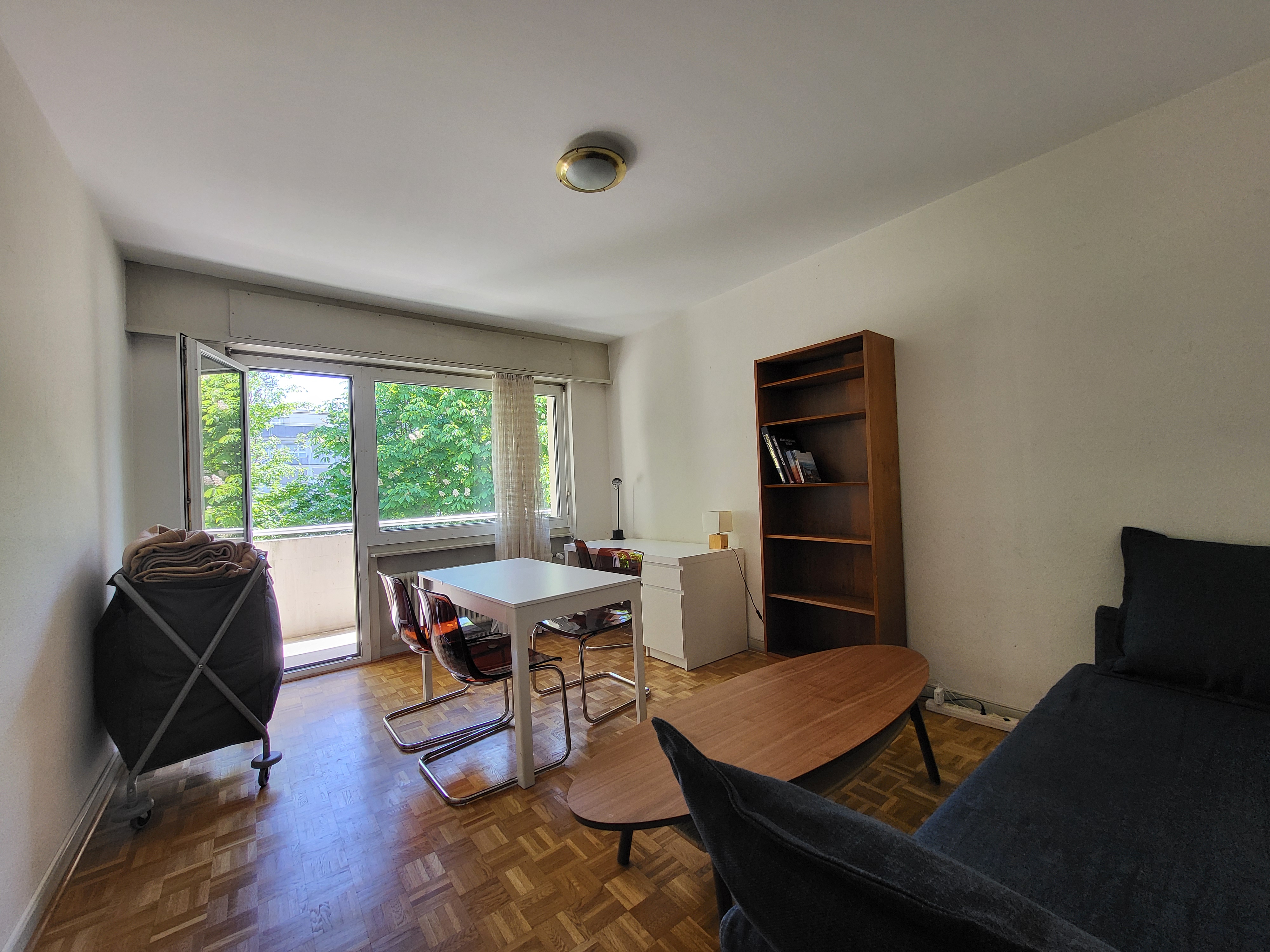 Image of the apartment's living room, with its new cosy furniture